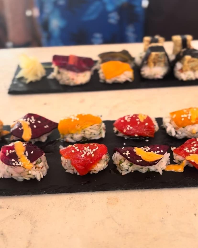 Two slates of nigiri made in a class