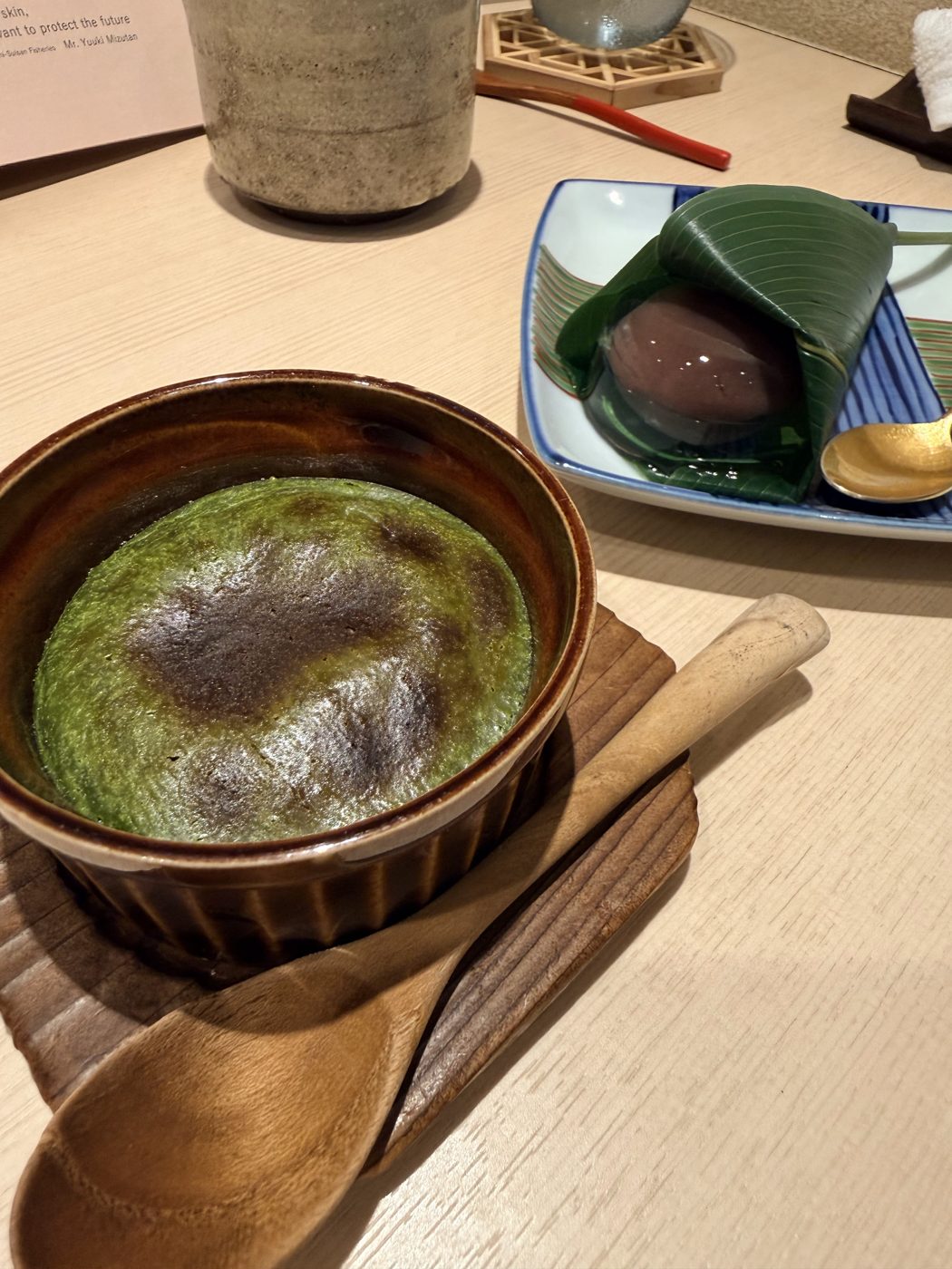 Baked matcha custard and leaf-wrapped red bean mochi