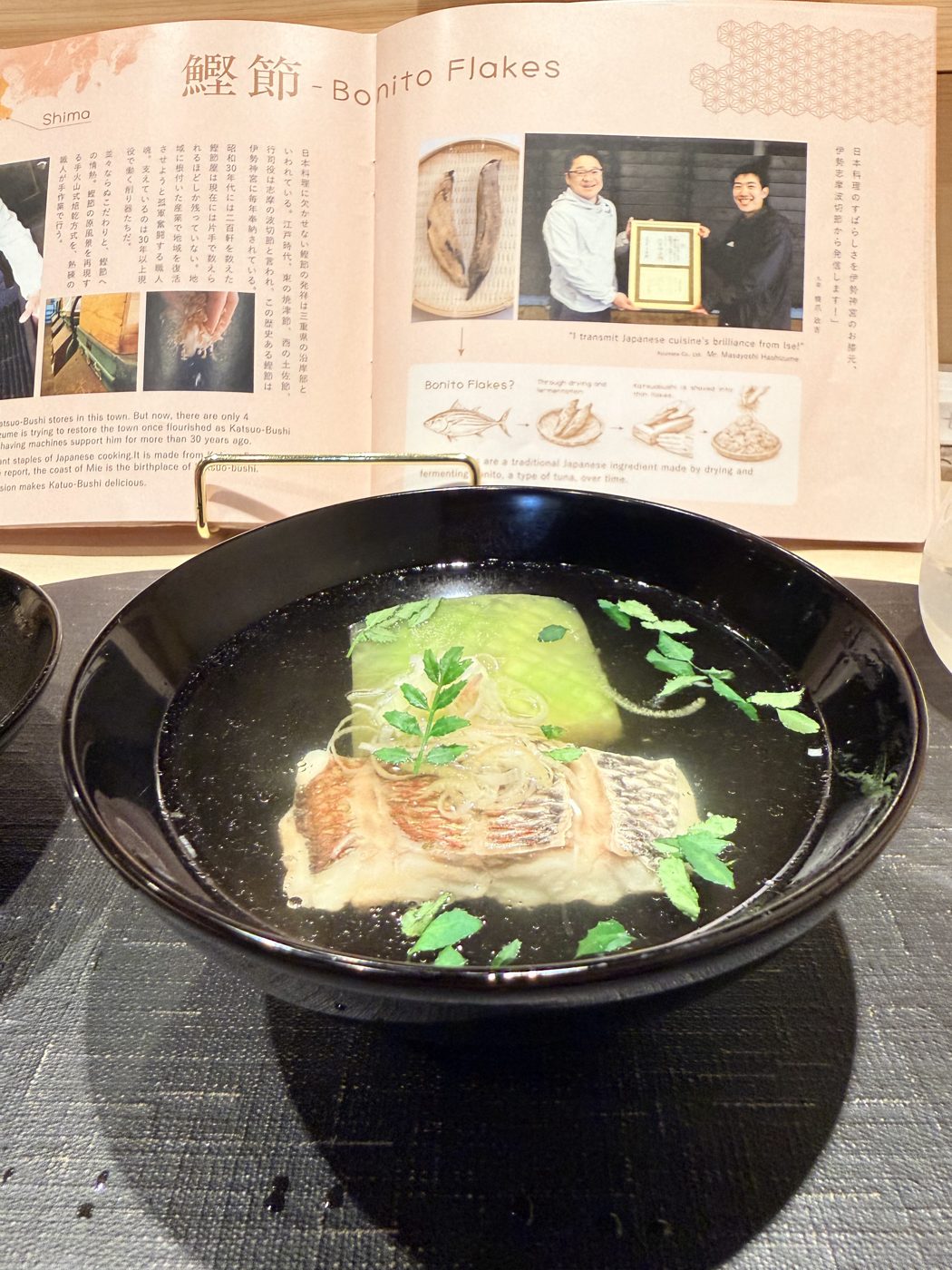 Sea bream and winter melon in clear dashi in a black lacquer bowl