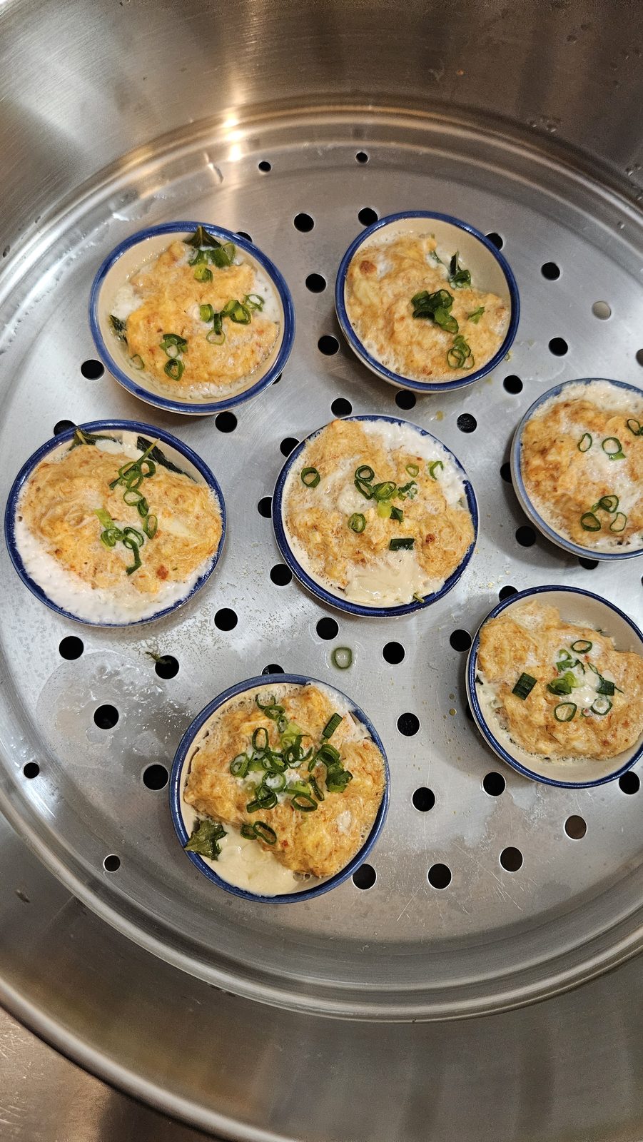 Steamed curry cups in a steamer tray