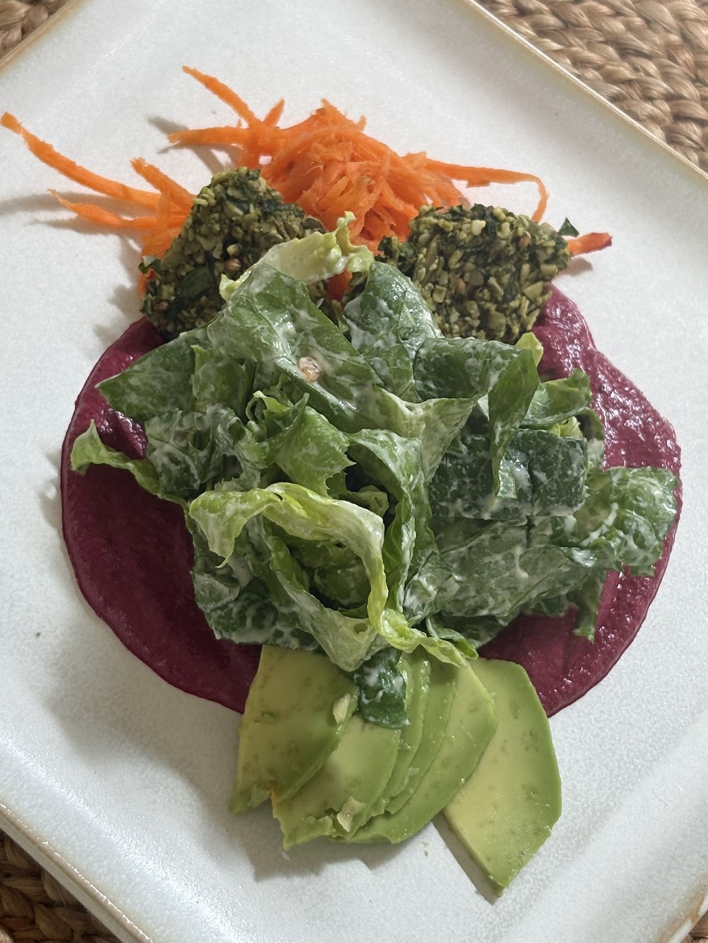 Kale caesar with carrot, croquettes and beet purée