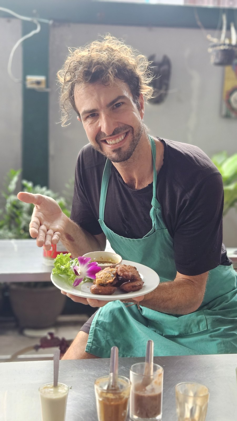 Chef Elliot with a plate he cooked at Three Trees