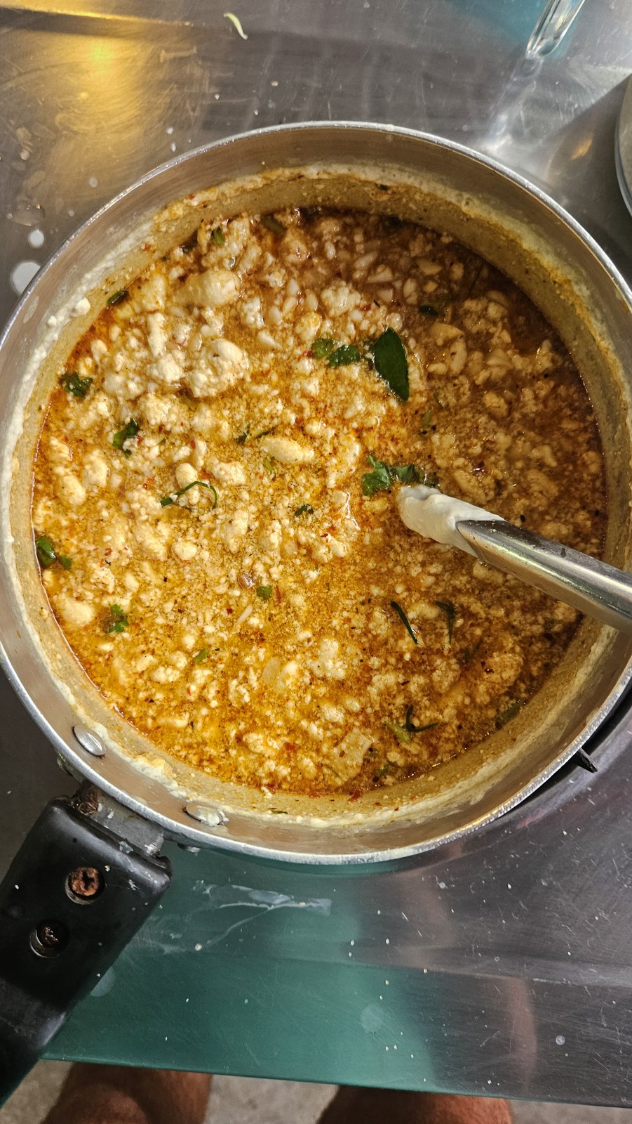 The red curry pot on the stove