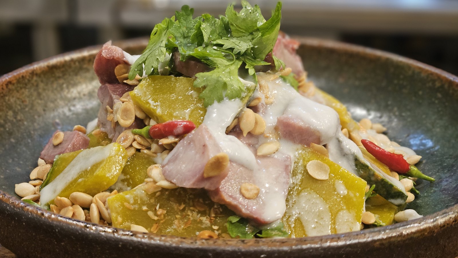 Pork and pumpkin salad with crispy shallots