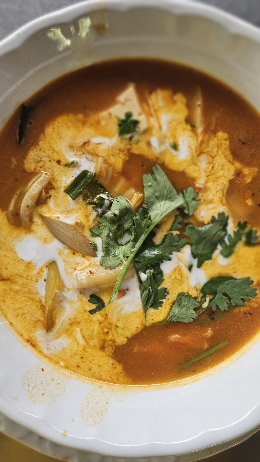 Red curry with coconut cream and coriander