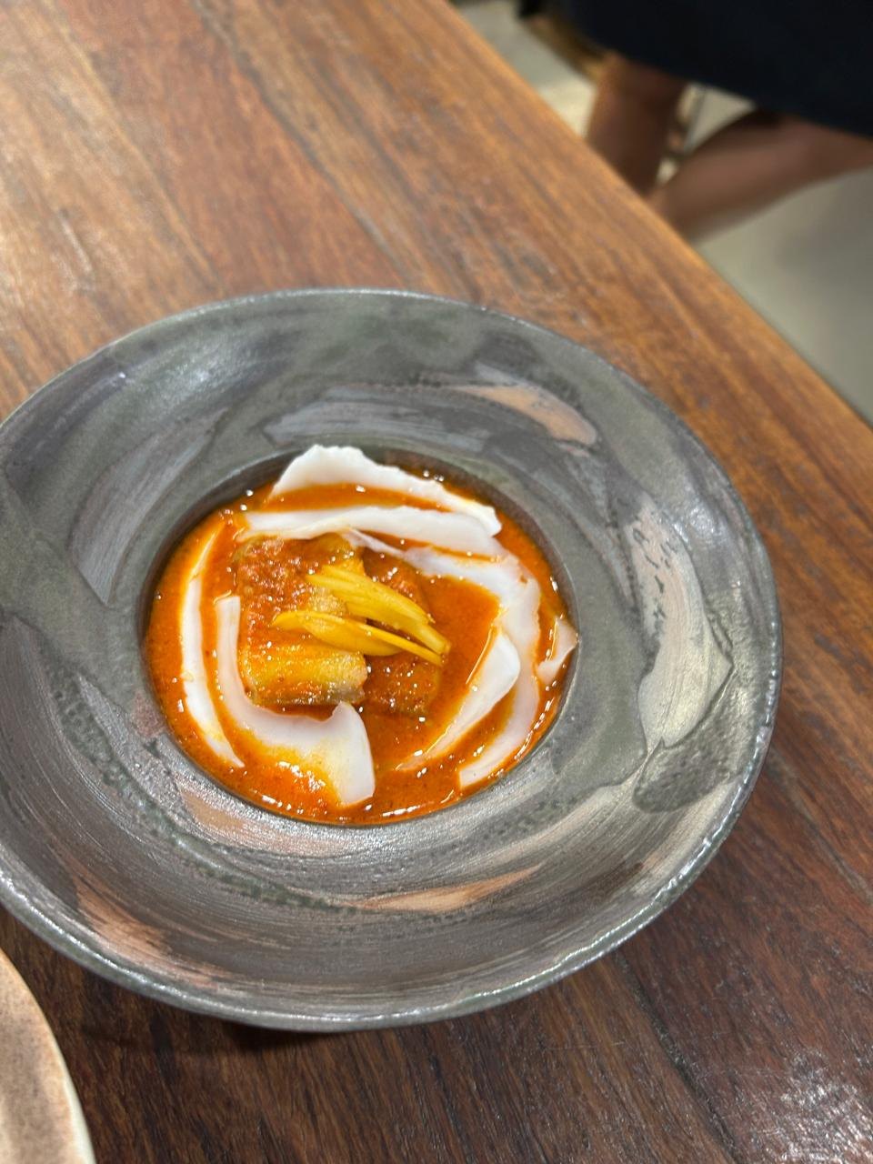Curry in a grey stoneware bowl