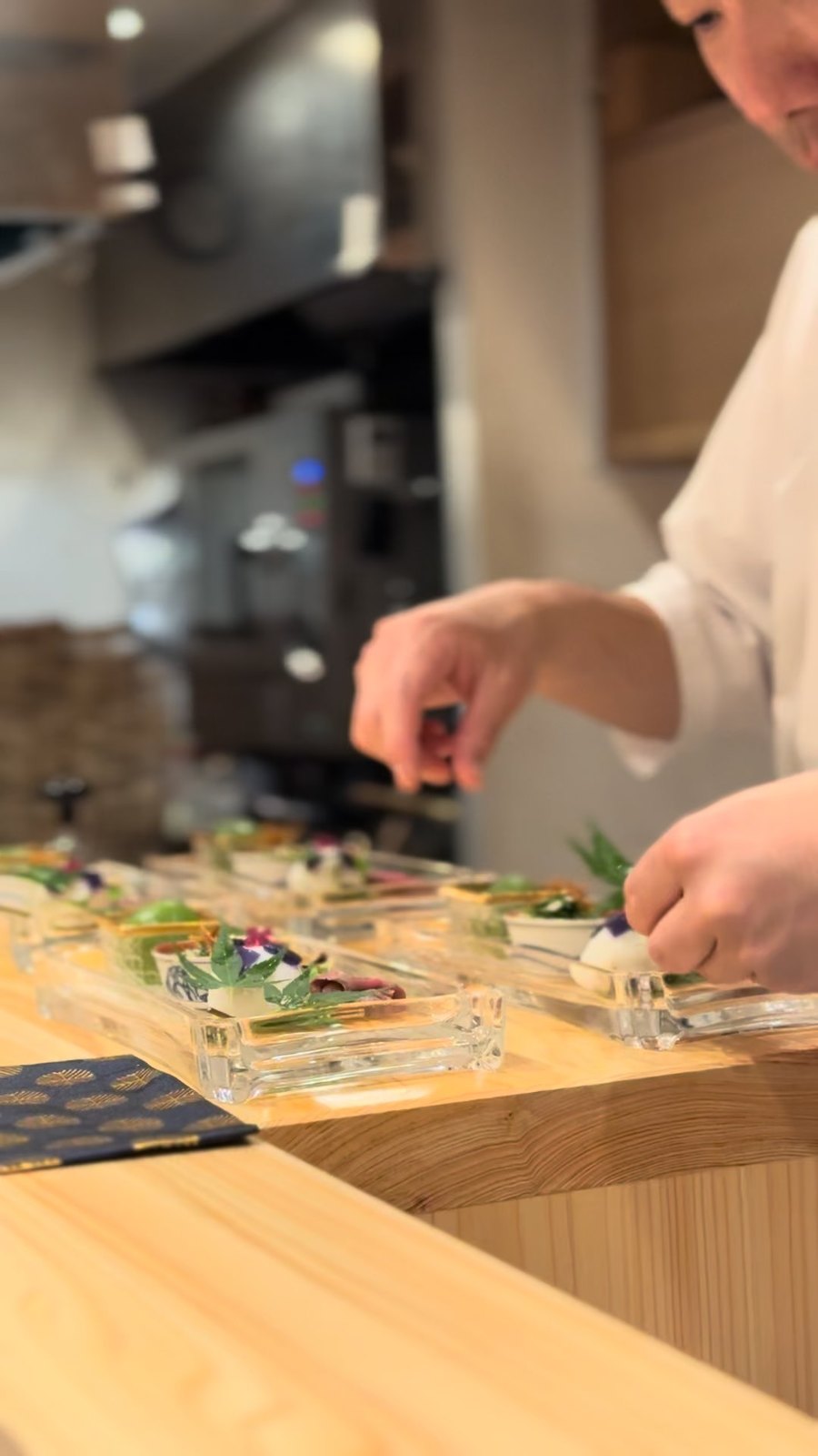 The chef's hands at the pass