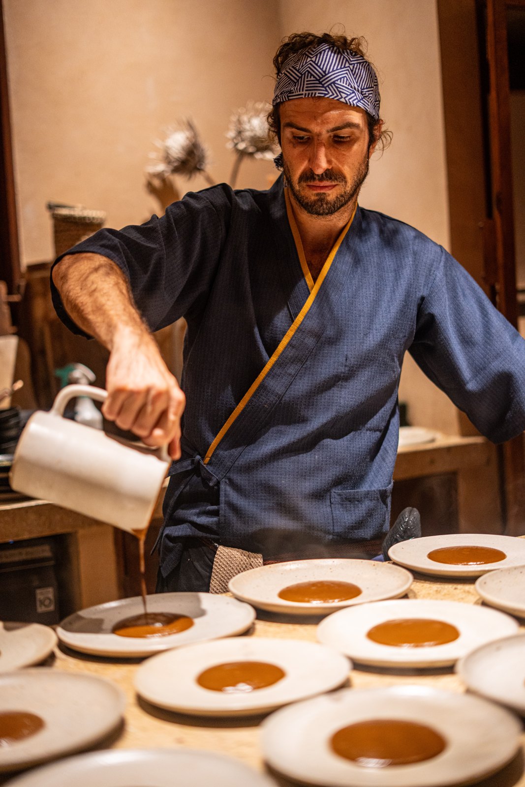 Pouring the broth down the line