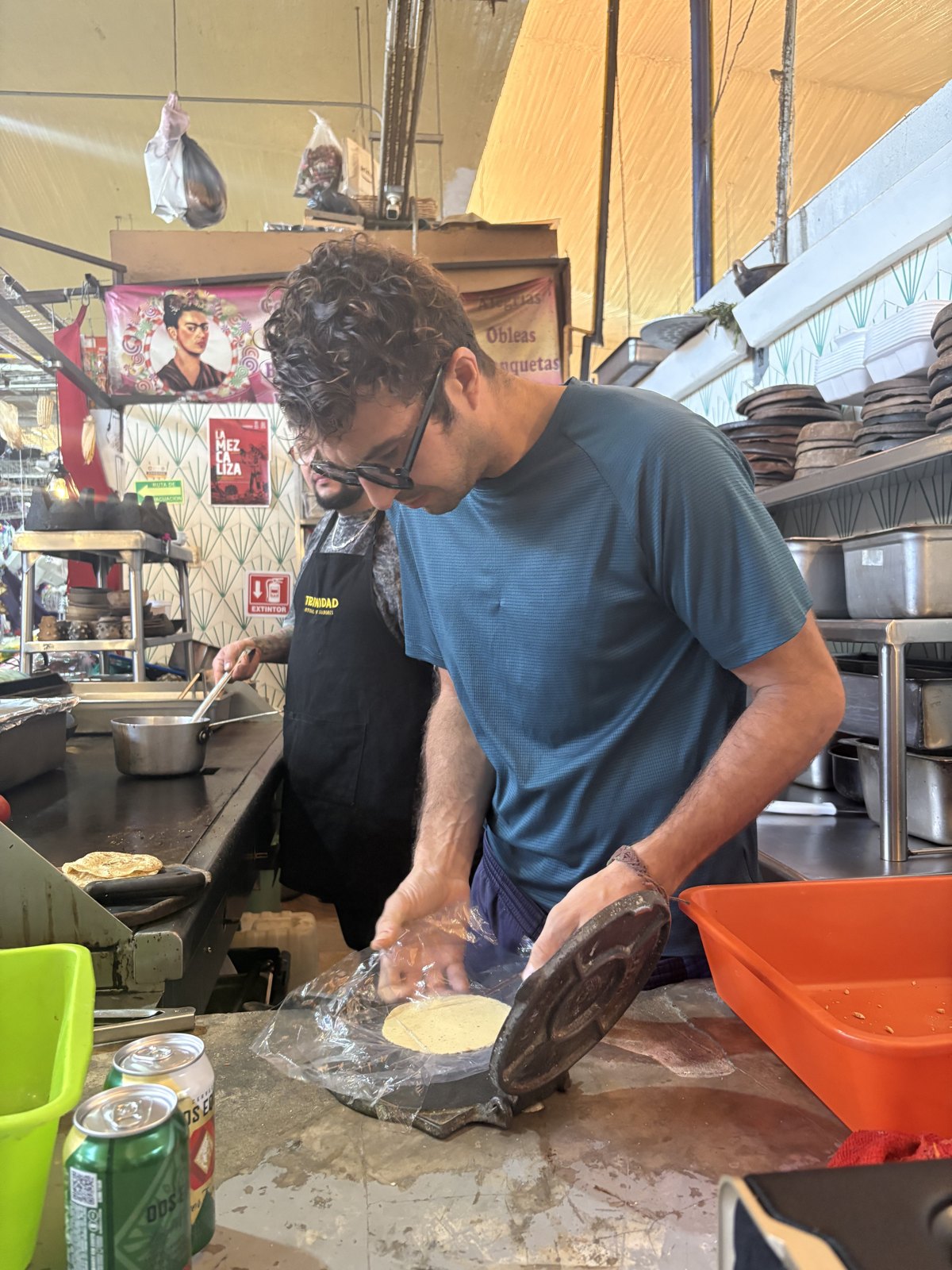 Pressing a tortilla by hand