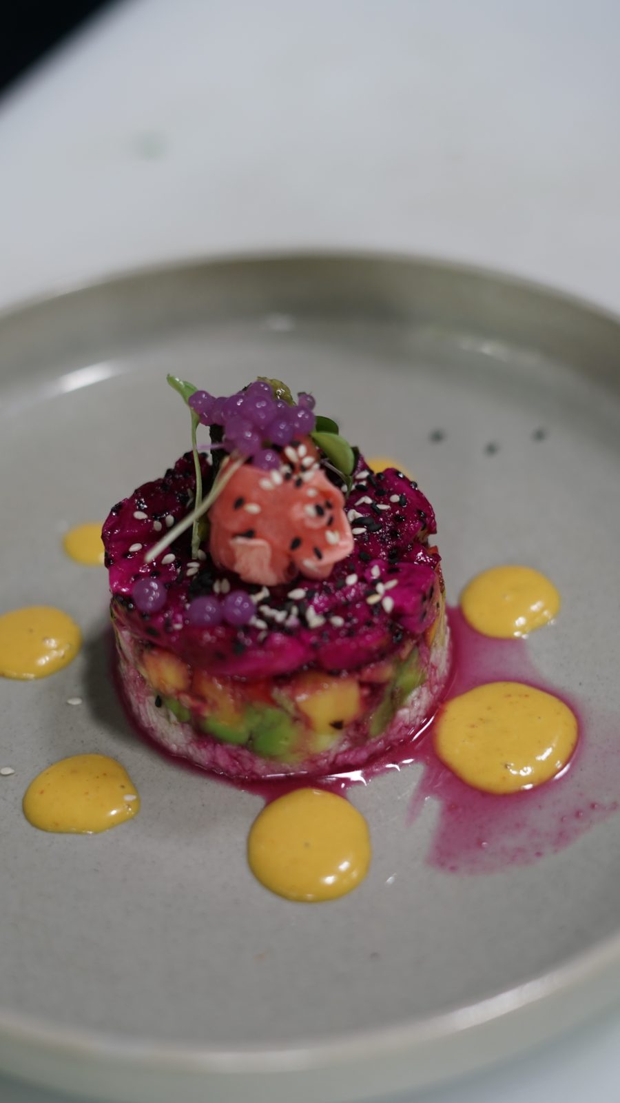 Beet tartare tower with mango dots
