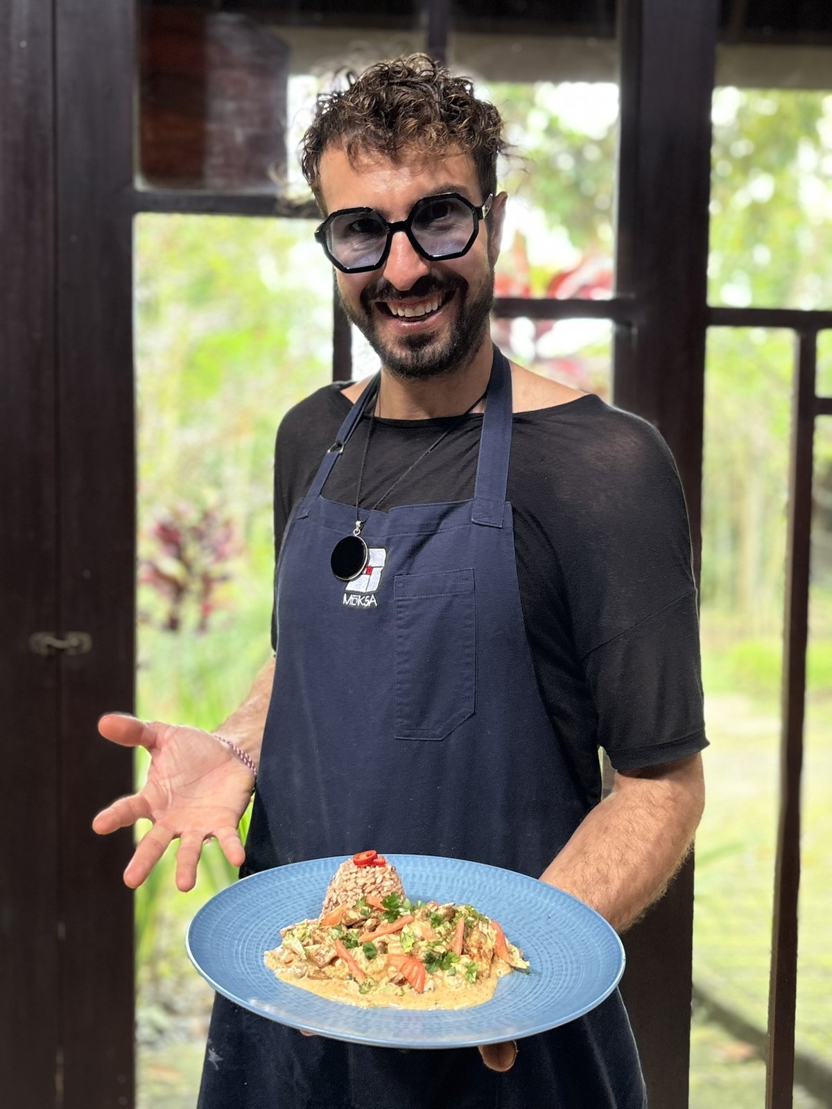 Chef Elliot with the finished plate at Moksa